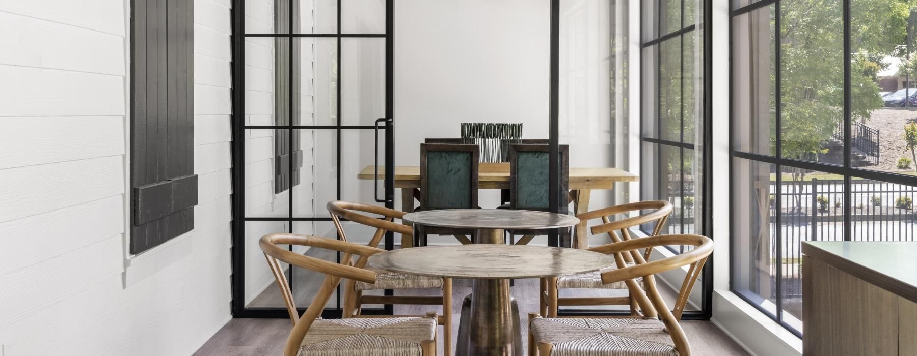 a dining room with a large glass door