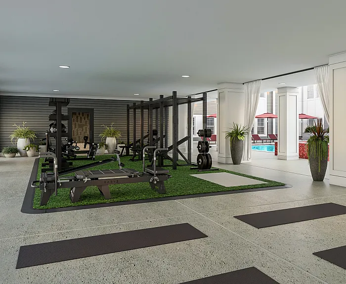 Rendering of a luxurious indoor gym with modern equipment and poolside view, accentuated by elegant decor and natural light.