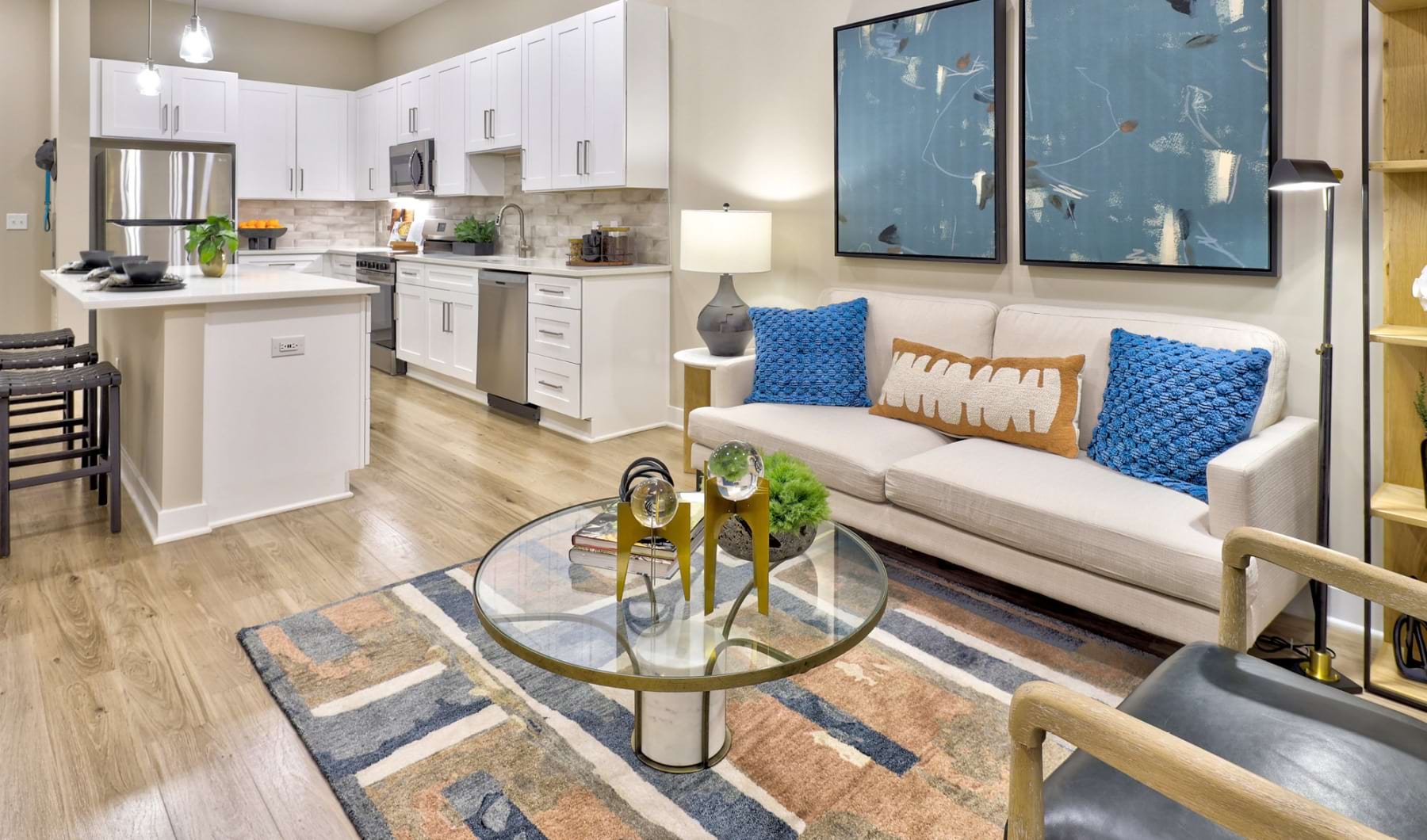 Living room and kitchen open concept floorplan in our apartments in Charlotte, NC.