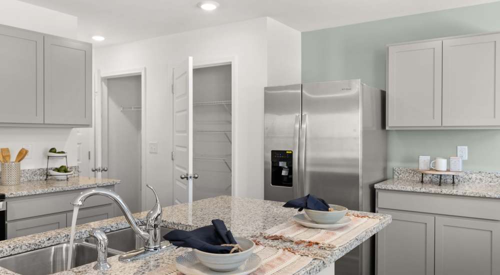 Stainless-steel appliances in a kitchen at The Lakes at Statham in Statham, Georgia