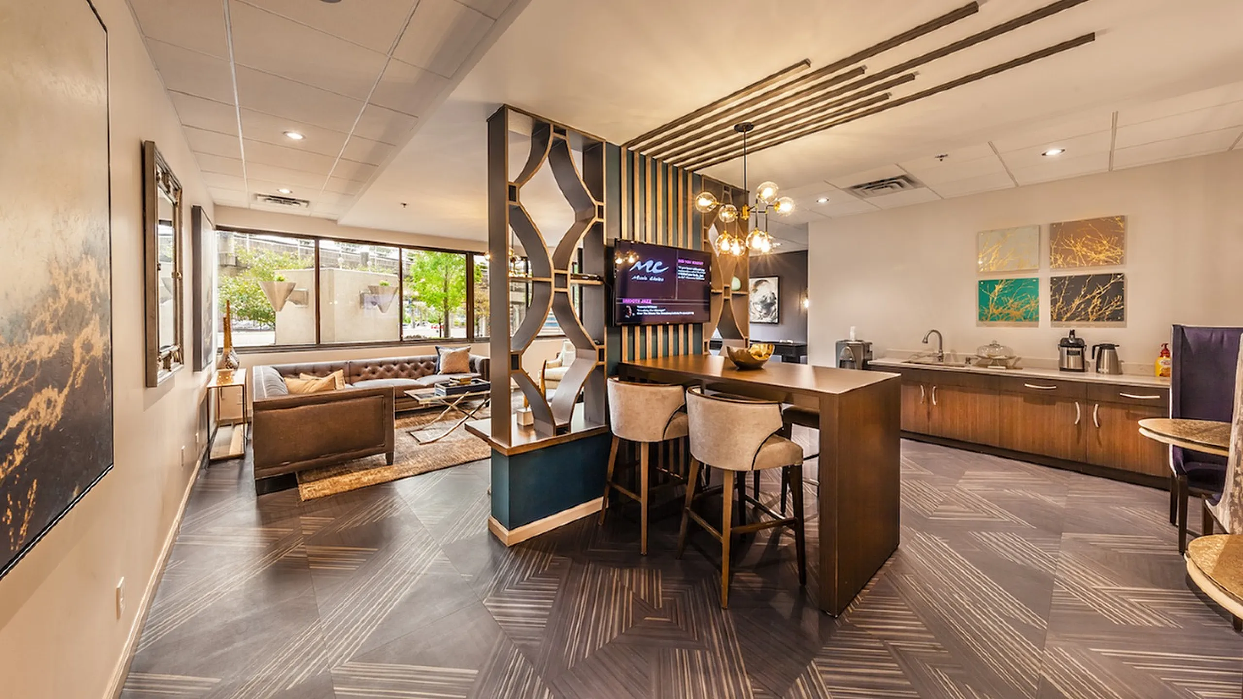 Sophisticated apartment lounge with stylish decor, featuring a chic seating area, modern bar counter, and artful lighting accents.