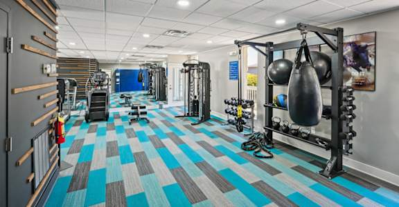 Affordable apartments in Marietta GA with fitness center and gym equipment for residents