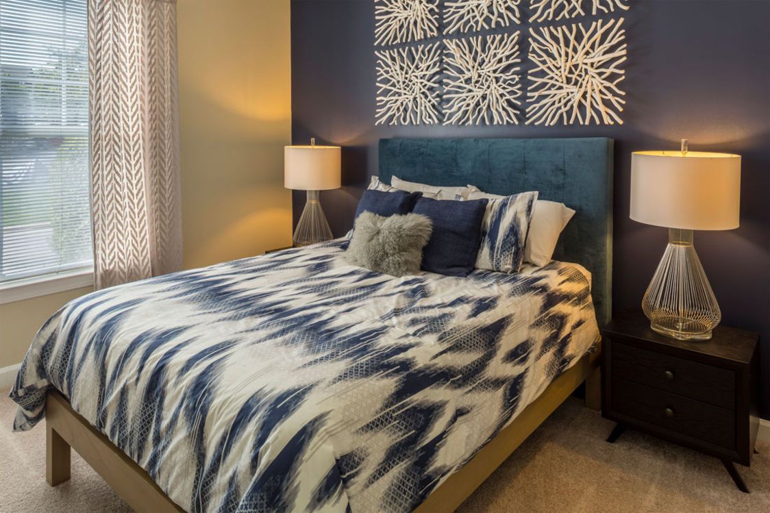 Furnished bedroom with an accent well.