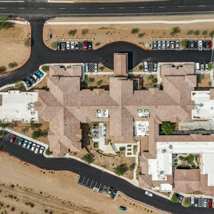 A welcoming retirement community surrounded by beautiful landscapes, promoting comfort and connection.