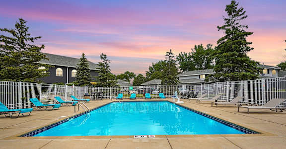our apartments have a resort style pool with chairs