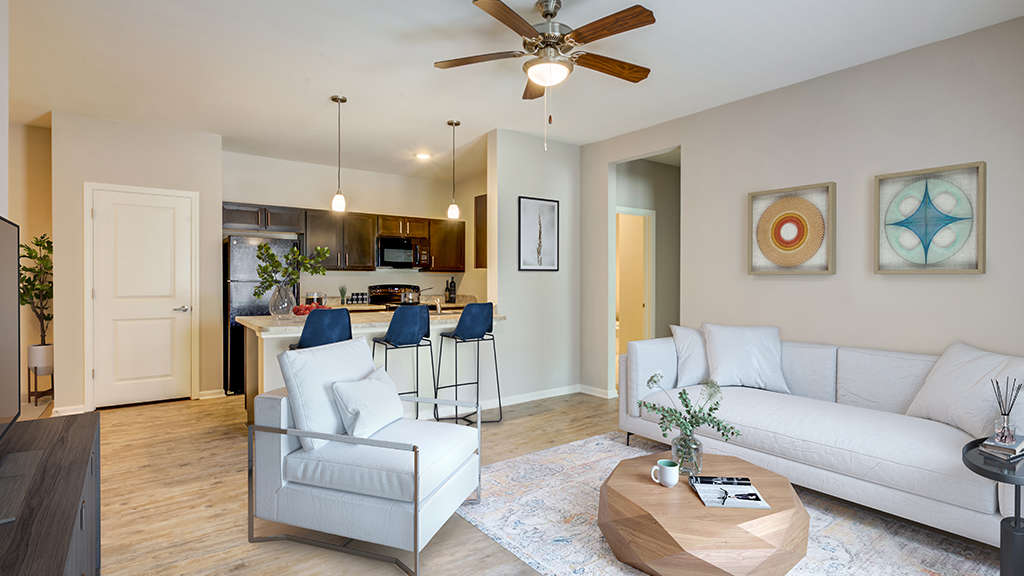 Open concept living room and kitchen at Menchaca Commons