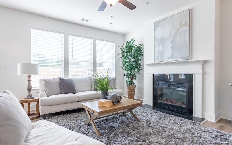 a living room with a fireplace