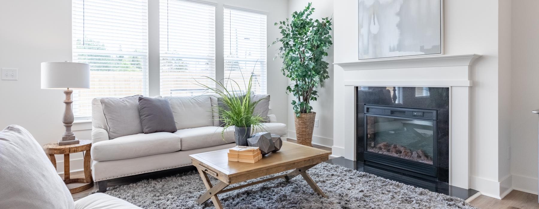 a living room with a fireplace