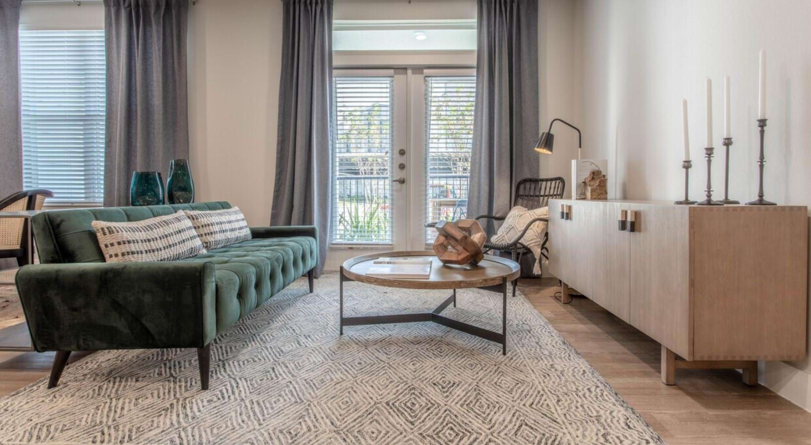 a living room with a couch and a table