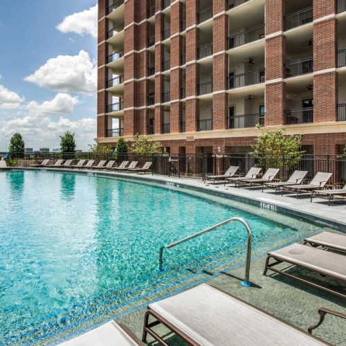 a swimming pool outside of a building
