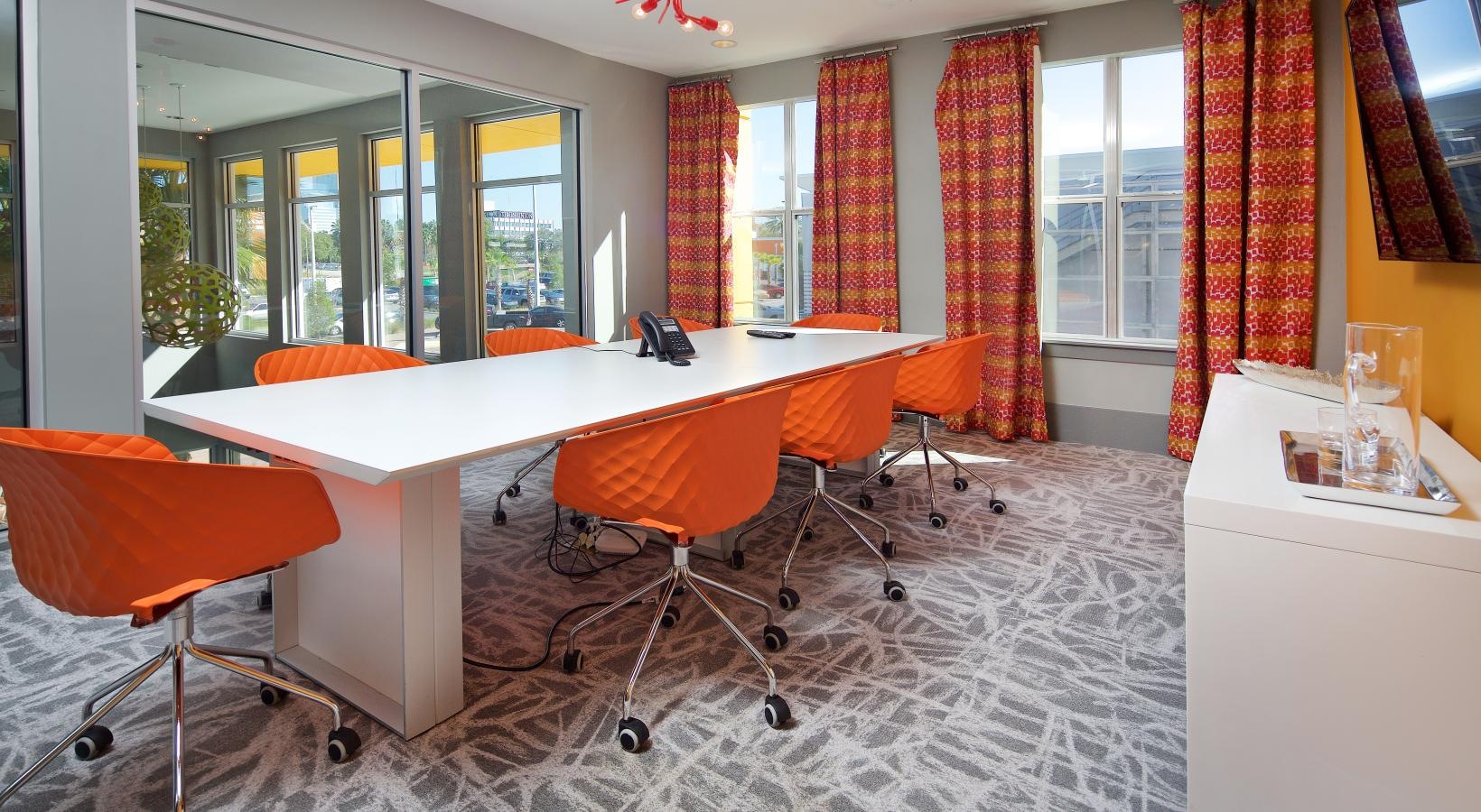 a room with a table and chairs