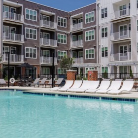 Outdoor resort-style swimming pool at Madison Ironbridge apartments on Ironbridge Road in Chesterfield Virginia.