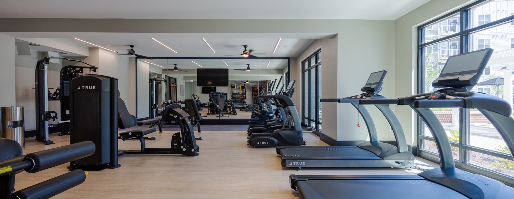 Modern fitness center at Madison Ironbridge apartments on Ironbridge Road in Chester VA.