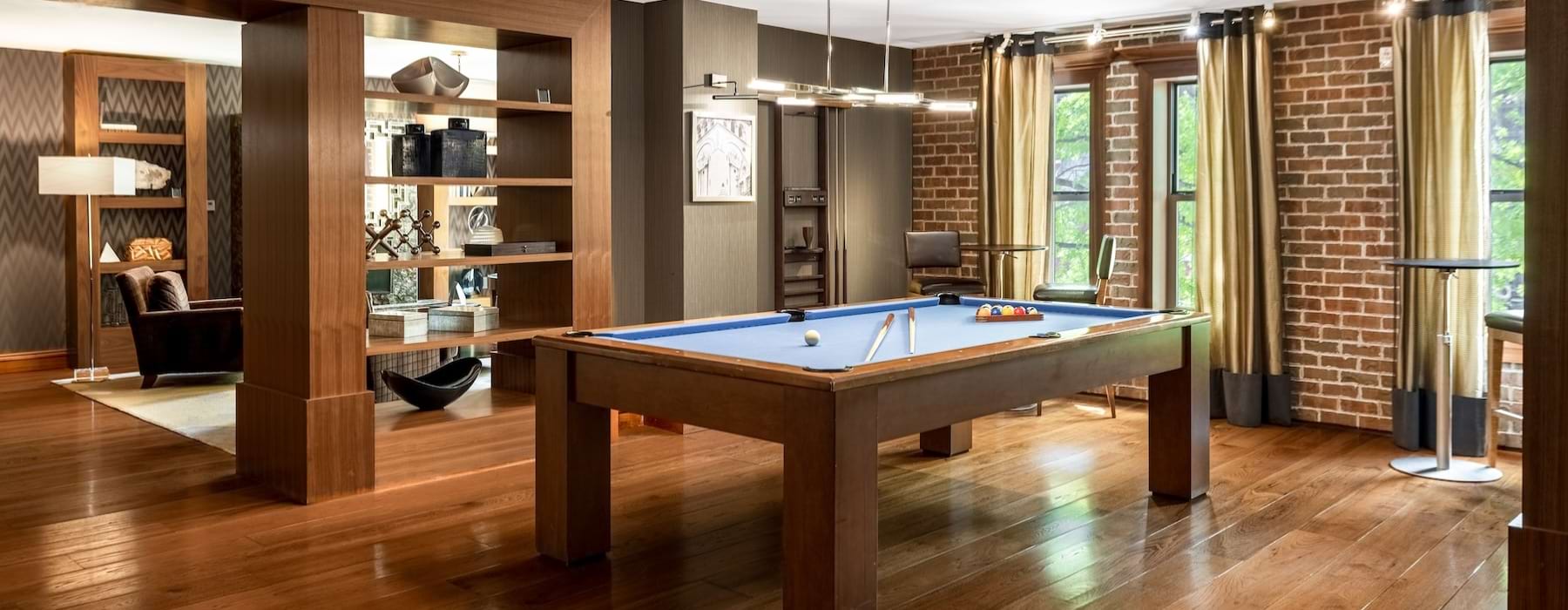 Resident clubroom with pool table at 14W apartments for rent in Washington DC.