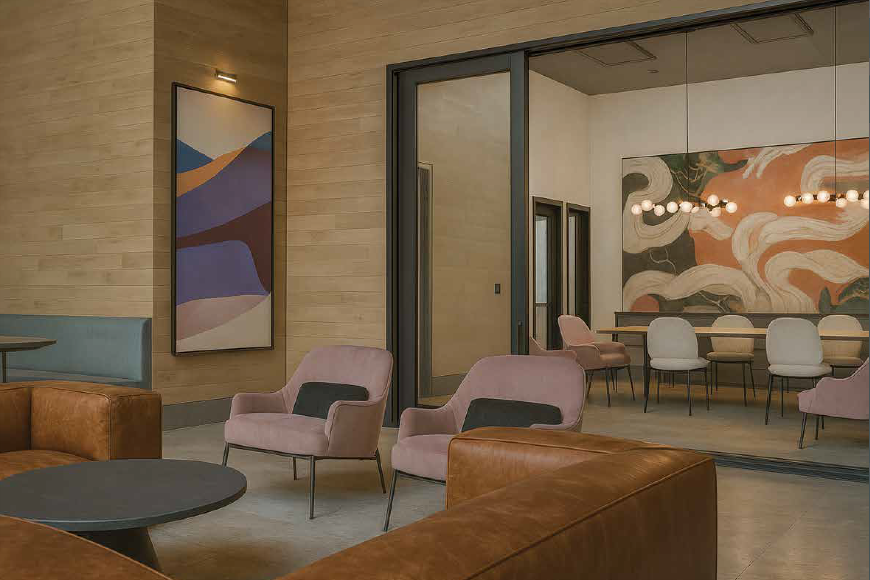 Rendering of a community seating area with a conference room in the background
