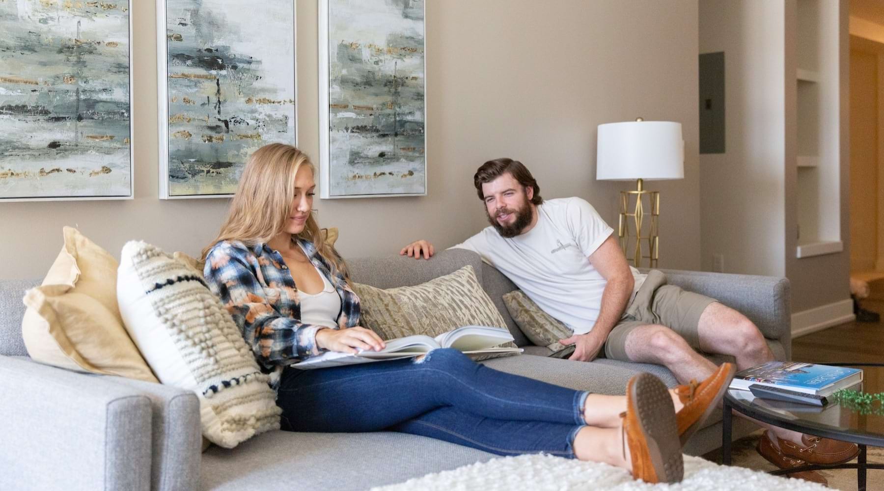 a man and a woman sitting on a couch