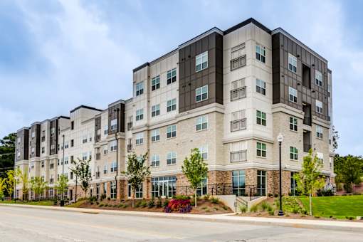 Exterior view of Townes at Clarkston Centre, a modern pet-friendly apartment community offering spacious 1, 2, and 3 bedroom apartments in Clarkston, GA.