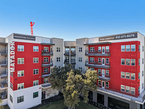 Aerial view of modern apartment exterior and courtyard at Matador Apartments, Austin, TX 78745