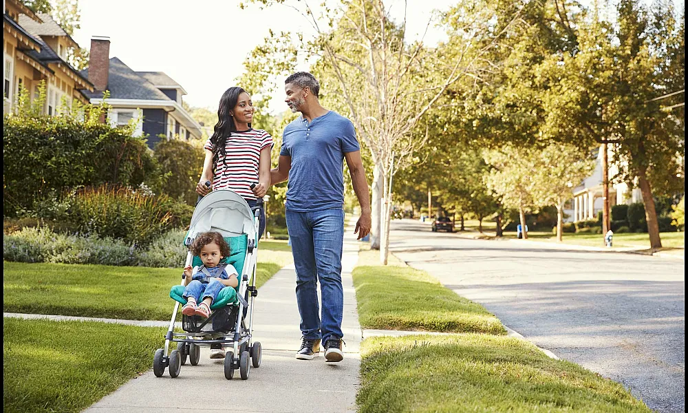 Family walking in neighborhood