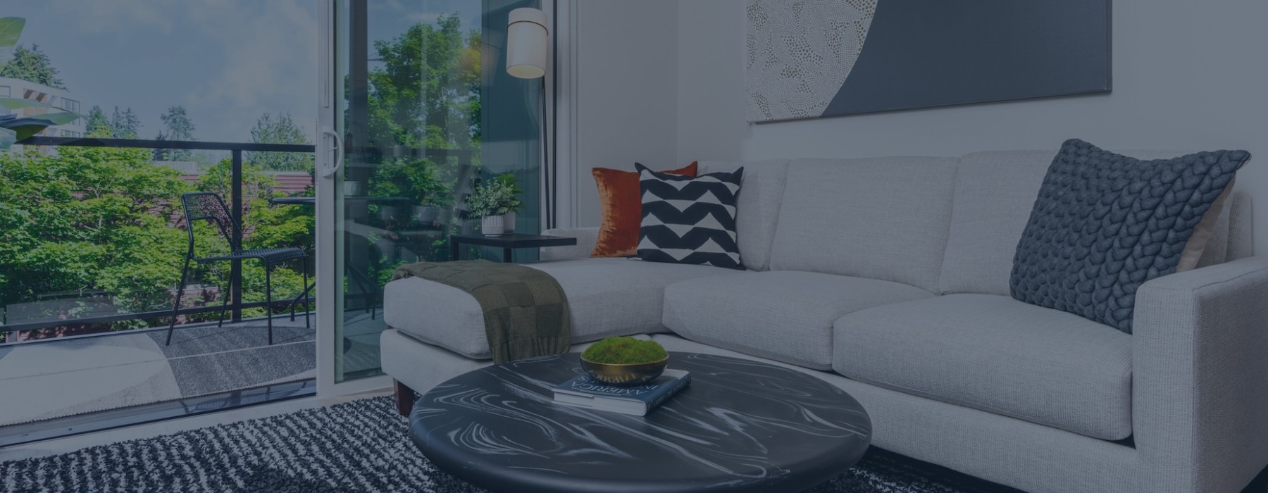 a living room with a couch and a coffee table