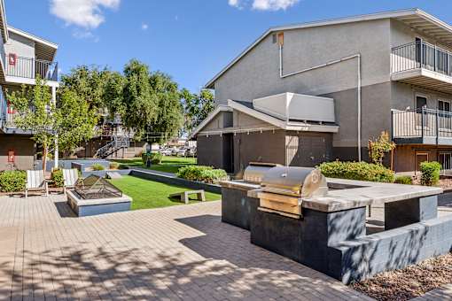 A modern house with a patio and a hot tub.